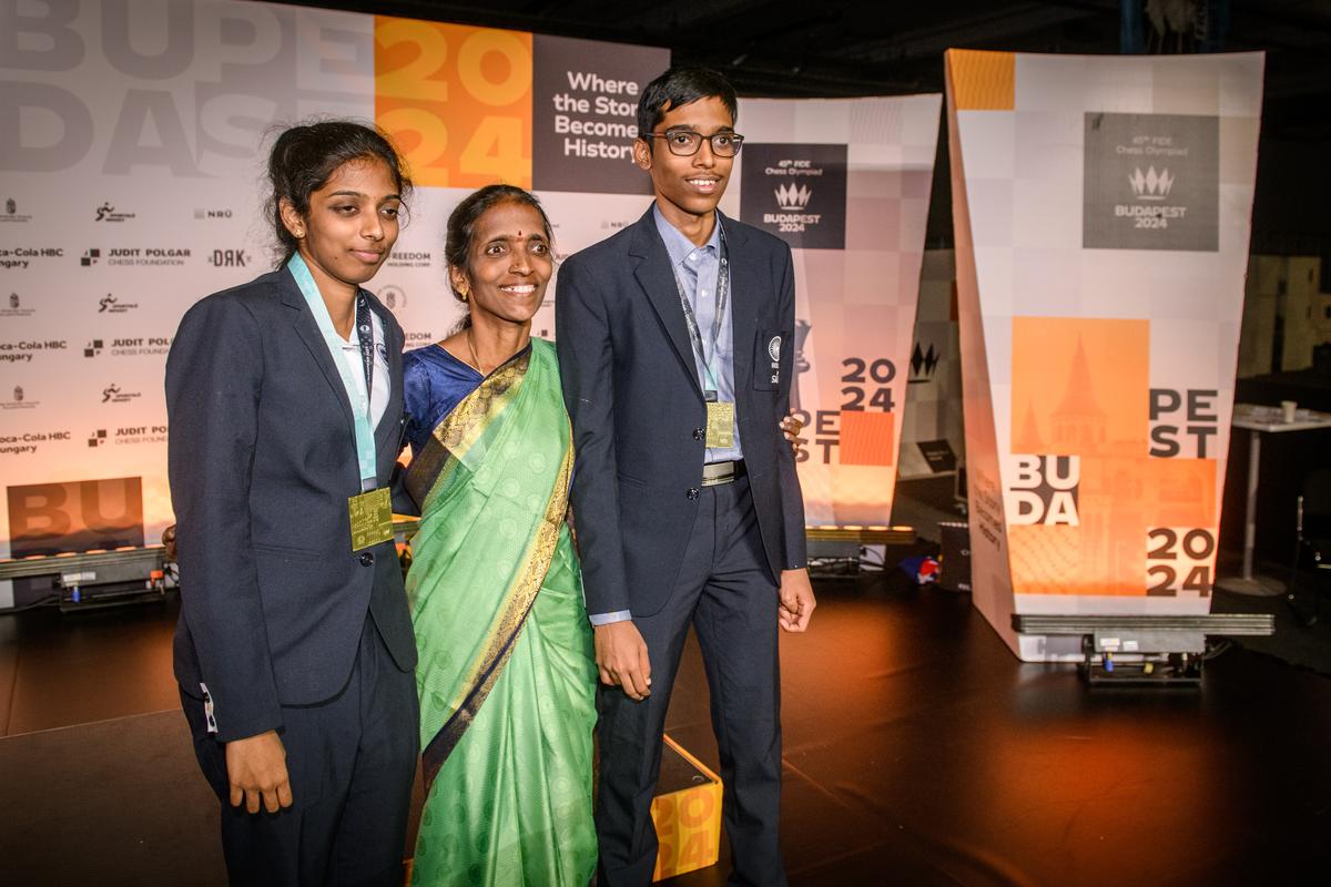 Strong bond: R. Praggnanandhaa stands alongside his two pillars of strength: his mother, Nagalakshmi, and his sister, fellow Grandmaster R. Vaishali.