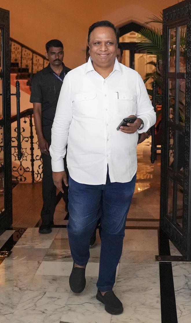 BCCI Treasurer Ashish Shelar arrives for the 91st Annual General Meeting in Mumbai on Tuesday.