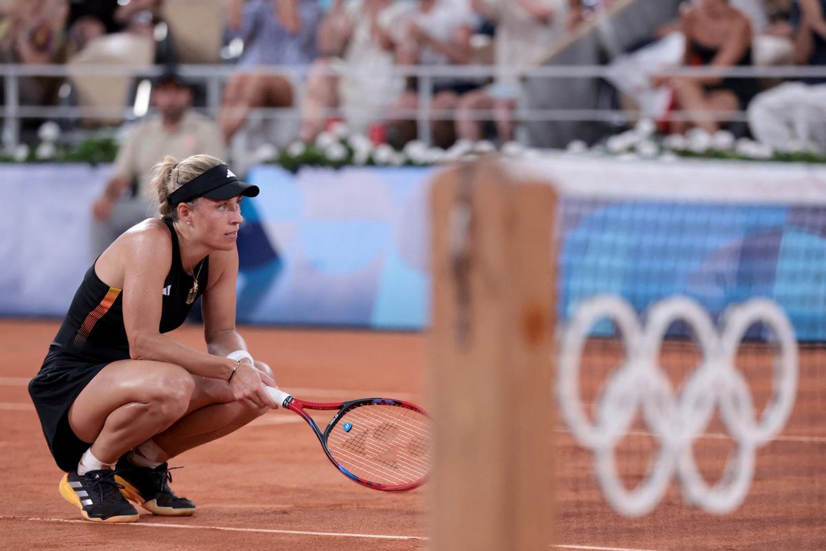 Germany’s Angelique Kerber reacts during her quarterfinal against China’s Zheng Qinwen in Paris Olympics at Roland Garros on July 31, 2024. 