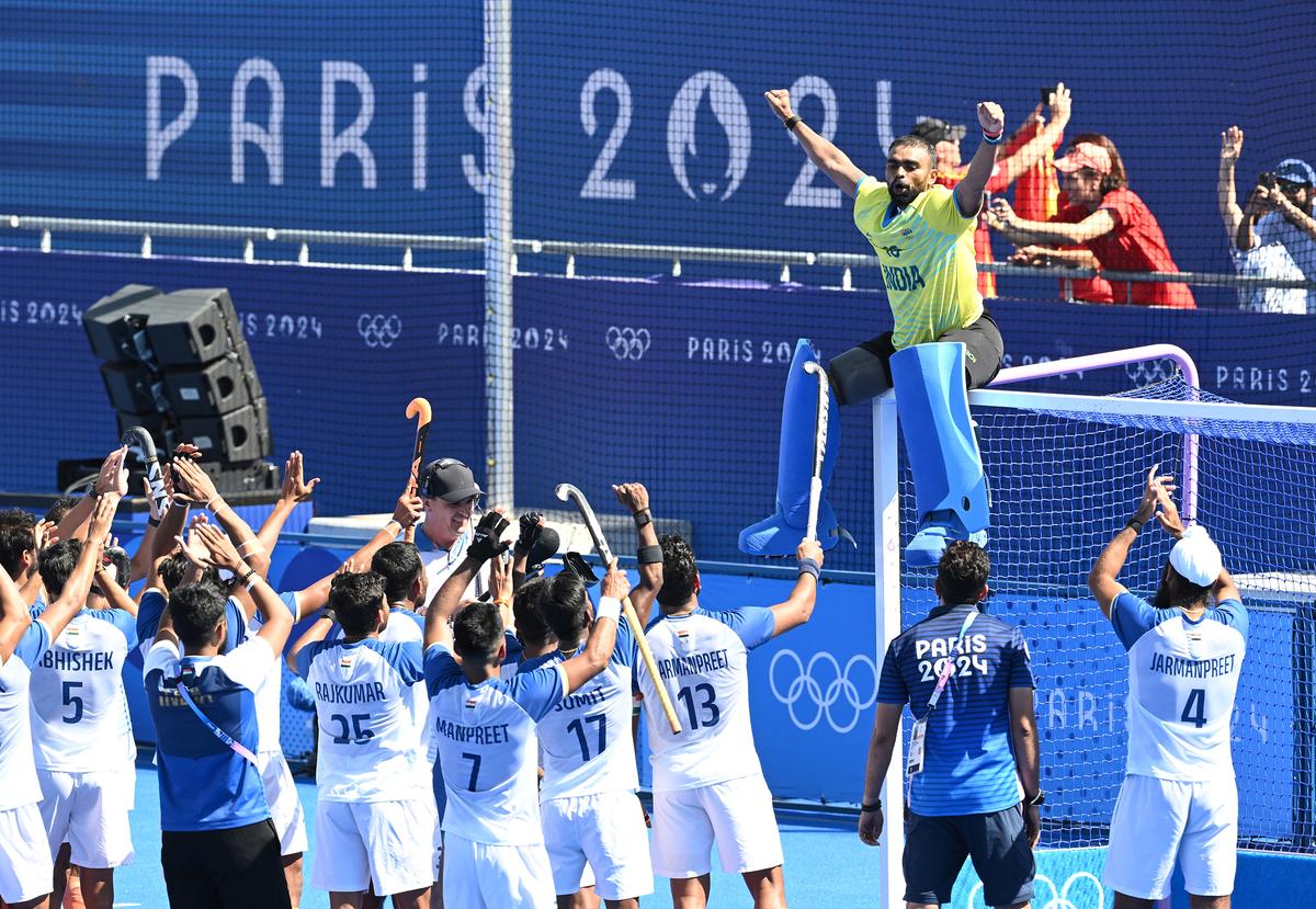 Indian hockey players pay tribute to P.R. Sreejesh after winning the bronze medal at Paris Olympics.