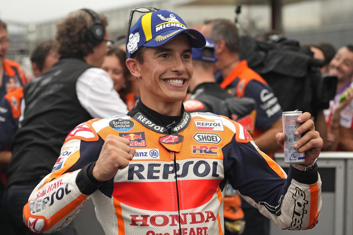 FILE PHOTO: Spanish MotoGP rider Marc Marquez celebrates after capturing pole position during the qualifying round of the Japanese Motorcycle Grand Prix at the Twin Ring Motegi circuit in Motegi, north of Tokyo.