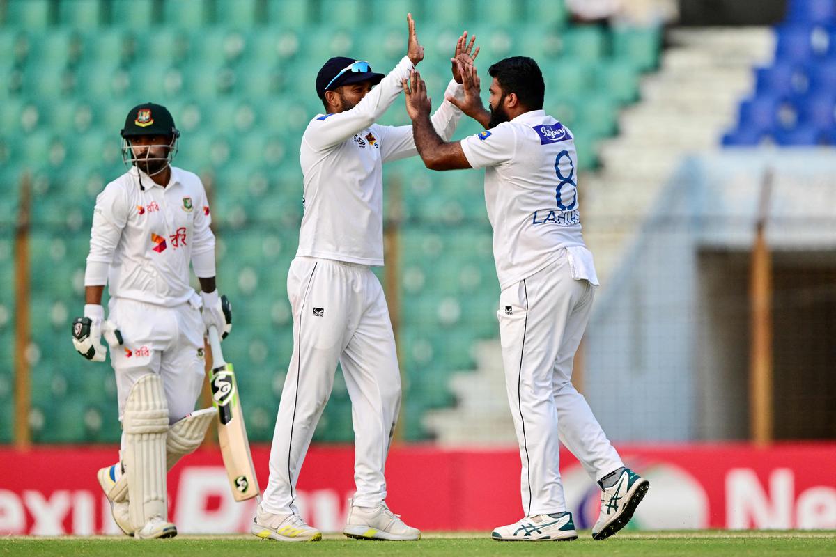 Sri Lanka’s Lahiru Kumara (R) celebrates with teammates after the dismissal of Bangladesh’s Litton Das (L) during the fourth day of the second Test cricket match between Bangladesh and Sri Lanka 