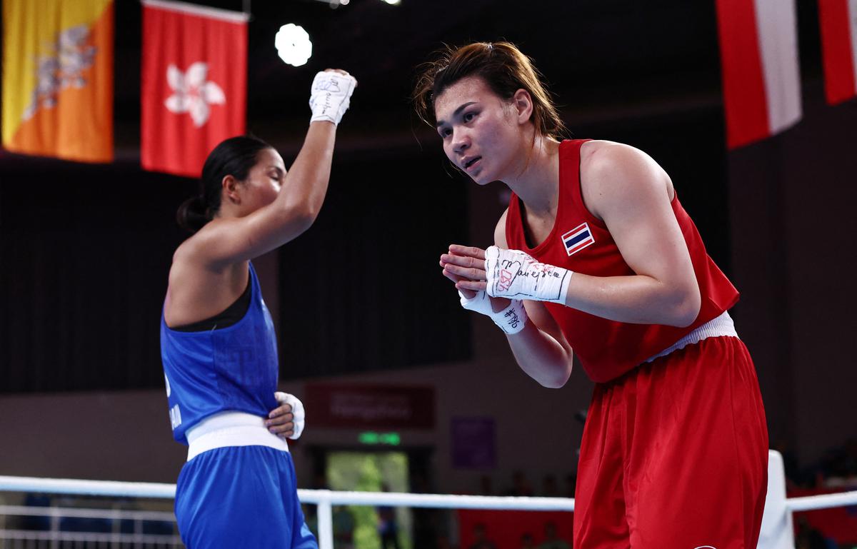 India’s Lovlina Borgohain celebrates after beating Thailand’s Baison Maneekon in the Women’s 66-75Kg Semifinal at the Asian Games in Hangzhou, China.