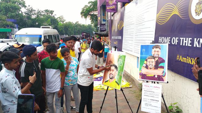 A painter at work outside the Eden Gardens on the eve of the IPL match, between Kolkata Knight Riders and Chennai Super Kings, on Saturday.