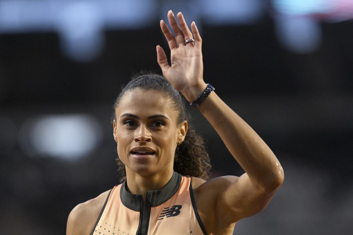 Sydney Mclaughlin-Levrone, of the United States, waves after winning a women’s 400 meters invitational race during the Diamond League final 2024 athletics meet in Brussels.