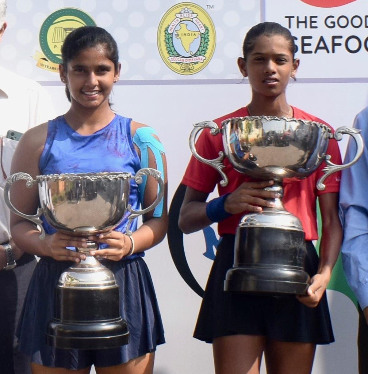 Laxmisiri Dandu and champion Maaya Rajeshwaran in the ITF
junior tennis tournament in Pune on Saturday.