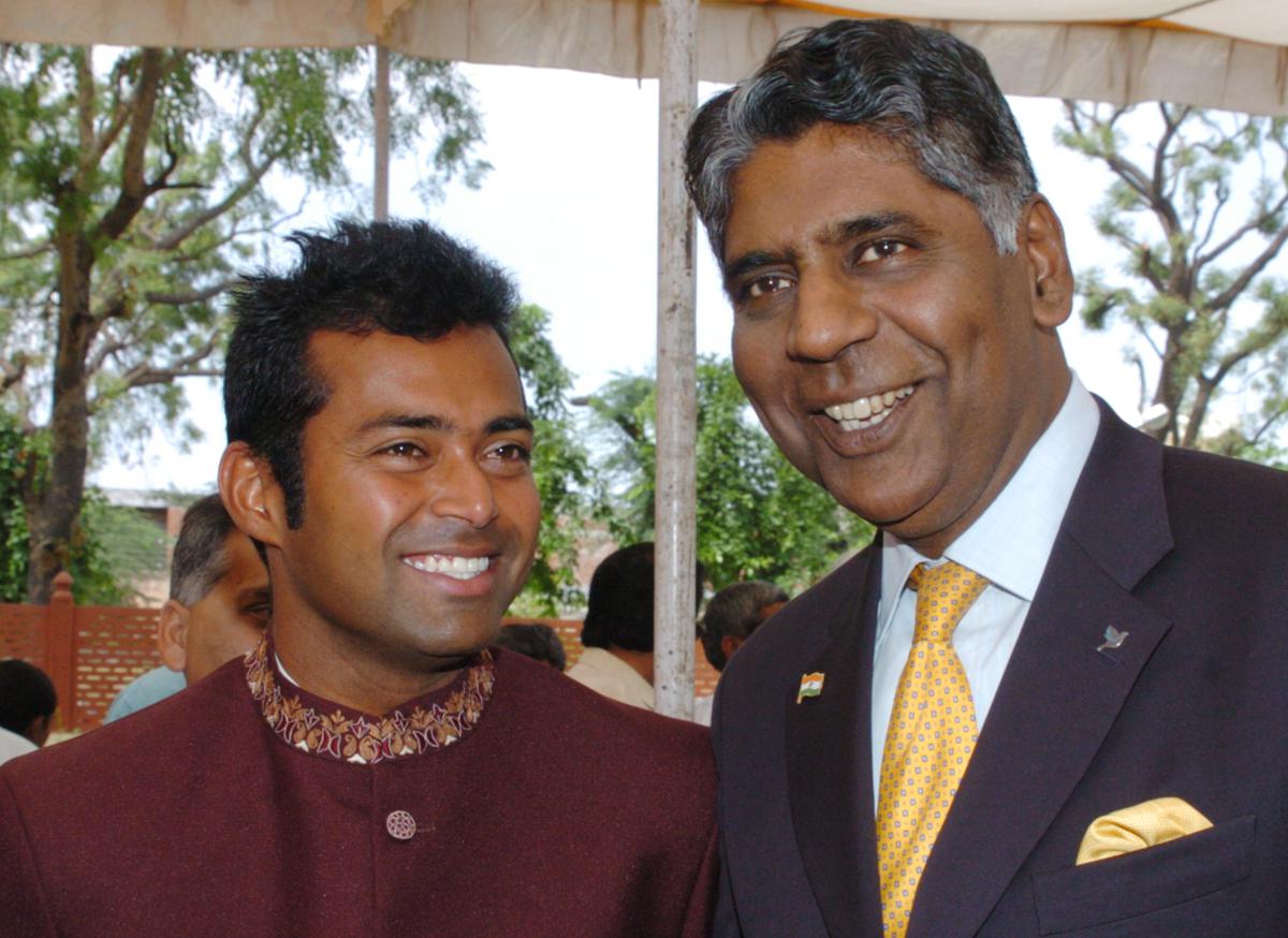 File | Indian captain Leander Paes shares a lighter moment with tennis Legend Vijay Amritraj during the Draw Ceremony of the Davis Cup  Asia - Oceania second round tie between India and Uzbekistan in Jaipur on April 28, 2005. 