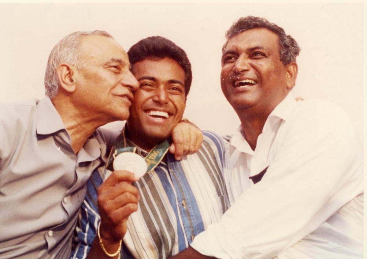 India’s Leander Paes being greeted by his father Vece Paes (right) and All India Tennis Association President, R.K. Khanna after winning the bronze medal in the Atlanta Olympics ‘96. 