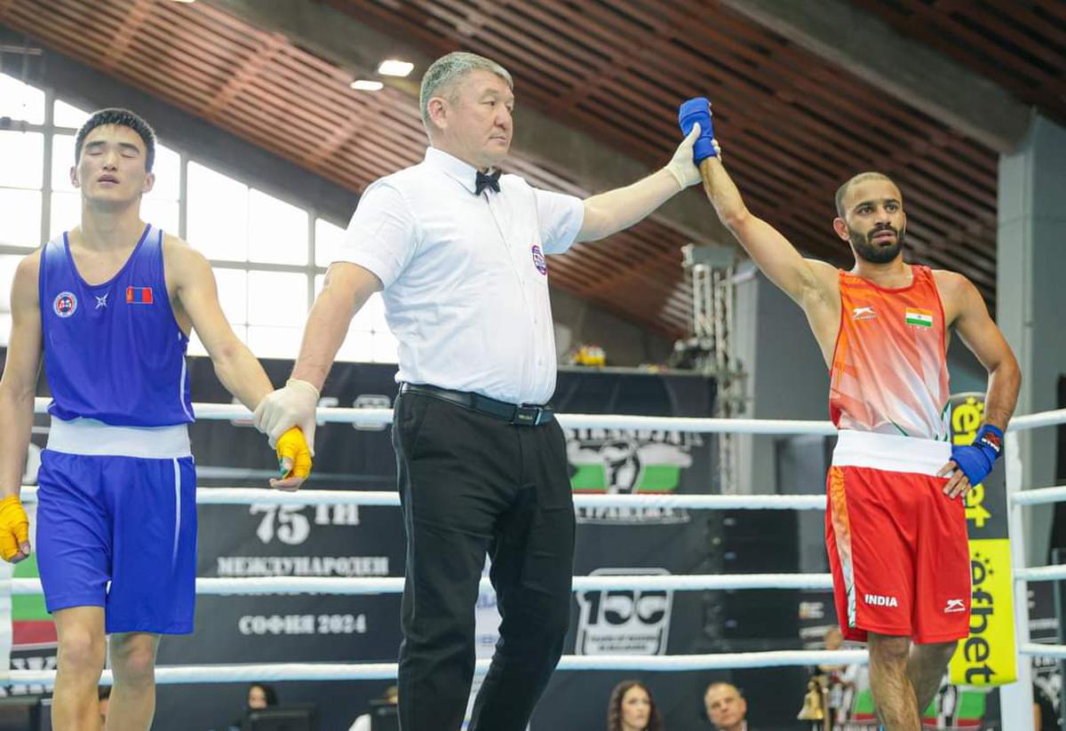 Amit Panghal after beating reigning world champion Sanzhar Tashkenbay.