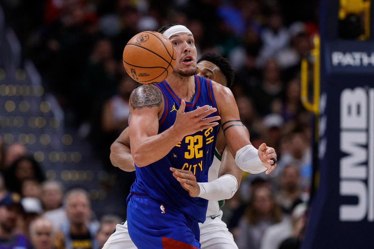 Aaron Gordon had 23 points, including two free throws with 4.4 seconds left, and host Denver held on to beat Milwaukee.