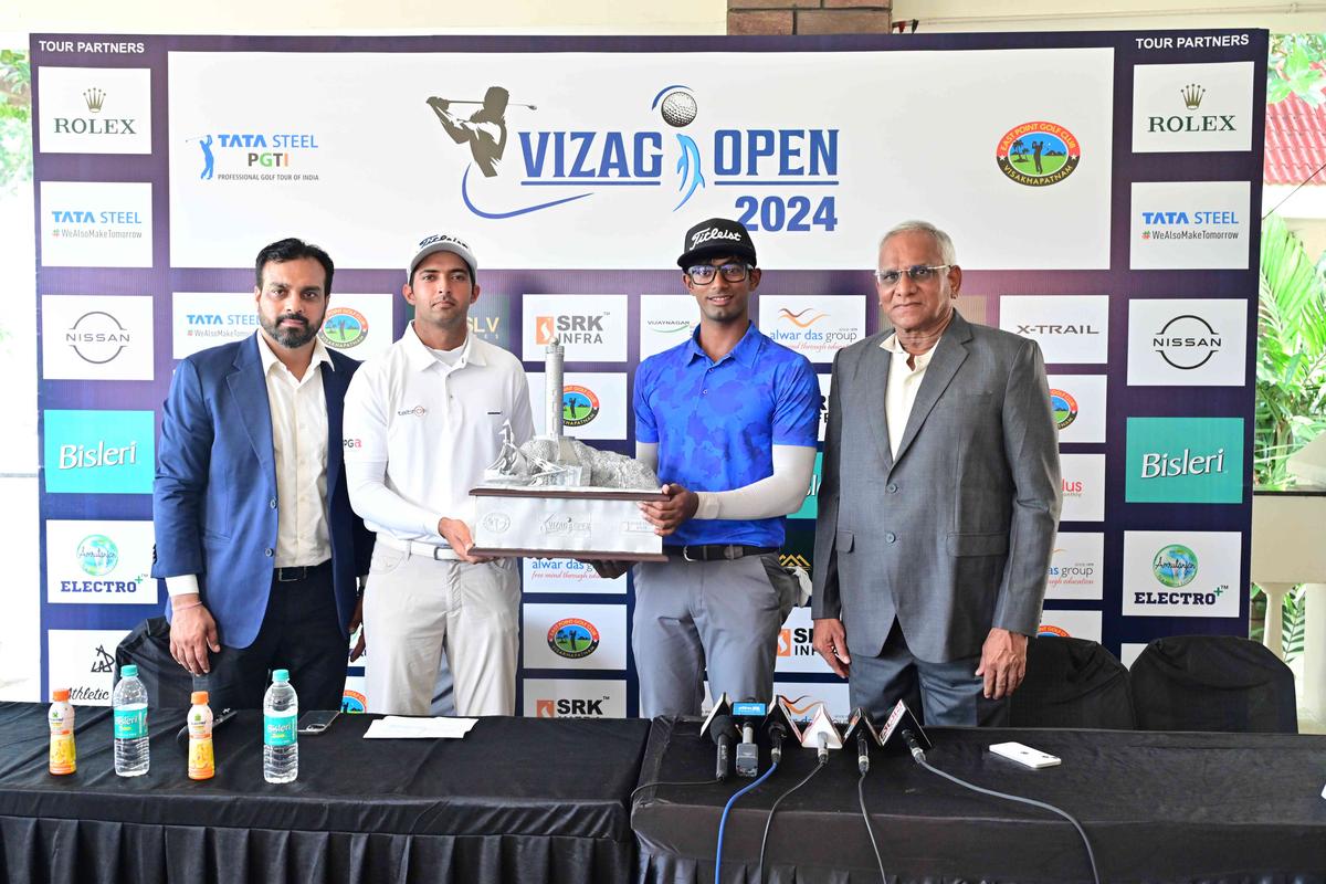 Leading Indian professionals Dhruv Sheoran (2nd from left) and Shaurya
Binu (2nd from right) pose with the Vizag Open golf championship
trophy along with other officials.