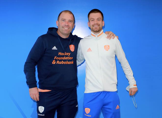 Netherlands Men’s Hockey Coach Jeroen Delmee with team captain Thierry Brinkman pose for a picture on their arrival at Biju Patnaik International airport. 