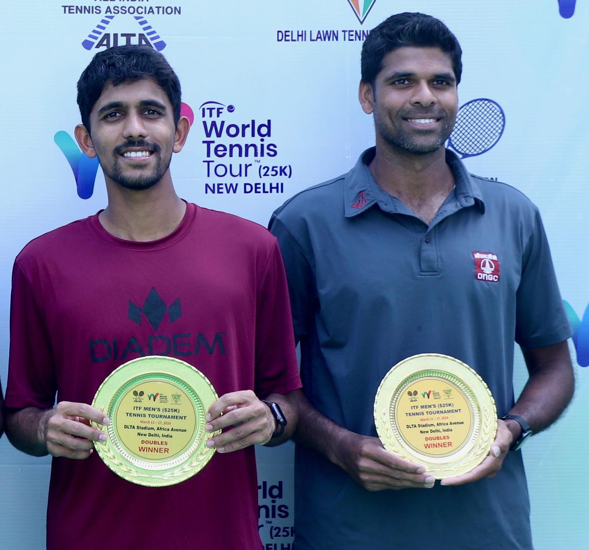 Doubles champions Siddhant Banthia and Vishnu Vardhan in the
ITF men’s tennis tournament in Delhi on Saturday