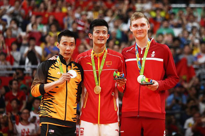 From left to right: Malaysia’s Lee Chong Wei (sliver medallist), China’s Chen Long (gold medallist) and Denmark’s Viktor Axelsen (bronze medallist) during the medal ceremony for the Men’s Singles at the 2016 Rio Olympics.