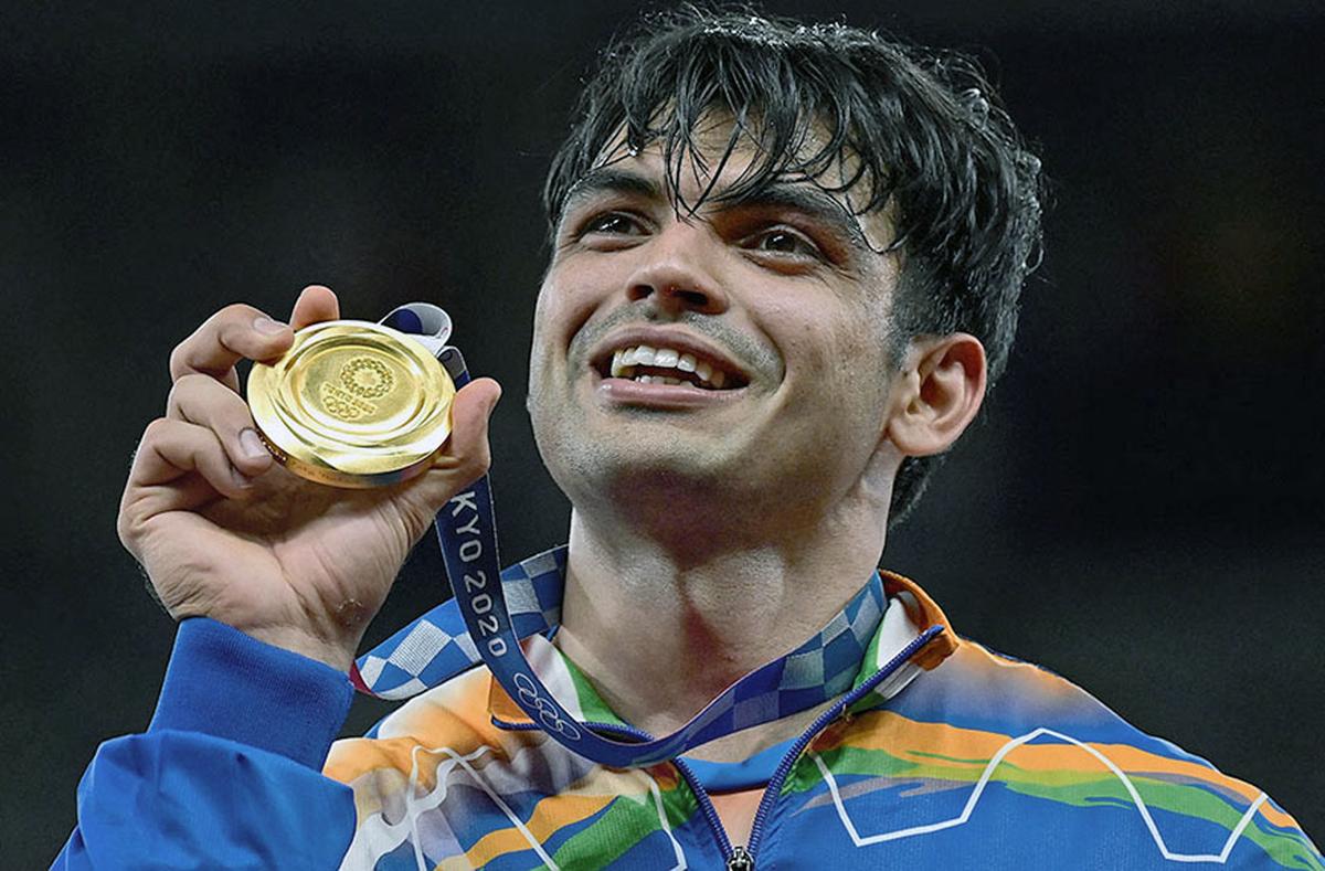 Gold medallist India’s Neeraj Chopra celebrates on the podium during the victory ceremony for the men’s javelin throw event during the Tokyo 2020 Olympic Games. 