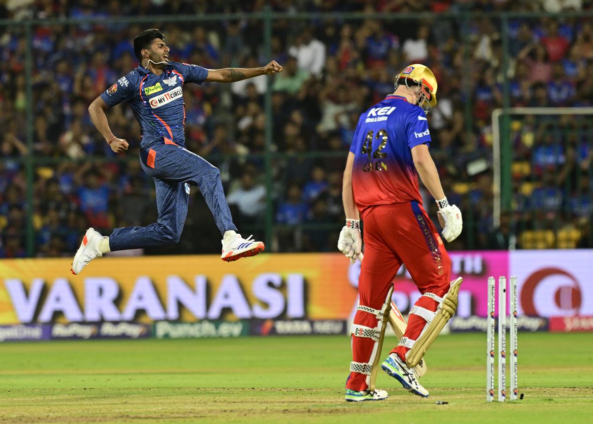 Mayank Yadav, who has been a revelation in IPL 2024, celebrates the wicket of RCB’s Cameron Green.