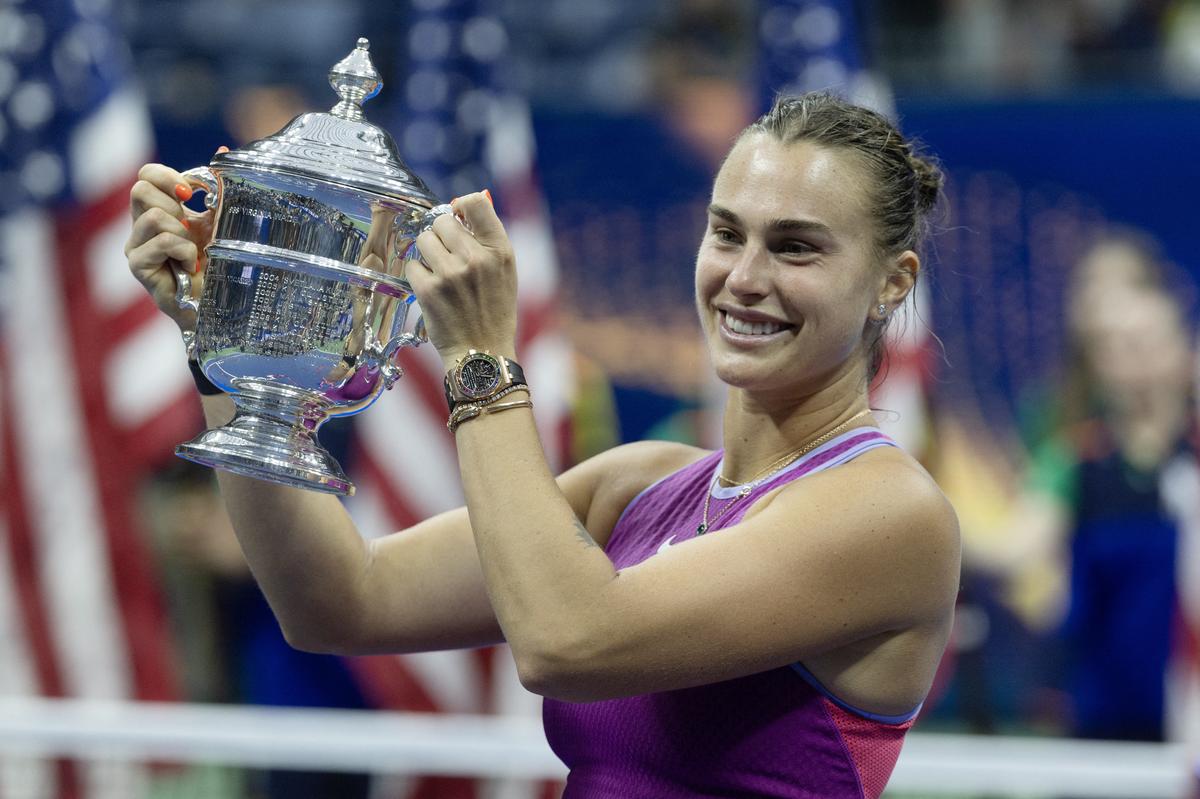 Reward for perseverance: Aryna Sabalenka poses with the US Open trophy after winning the title at Flushing Meadows for the first time ever.