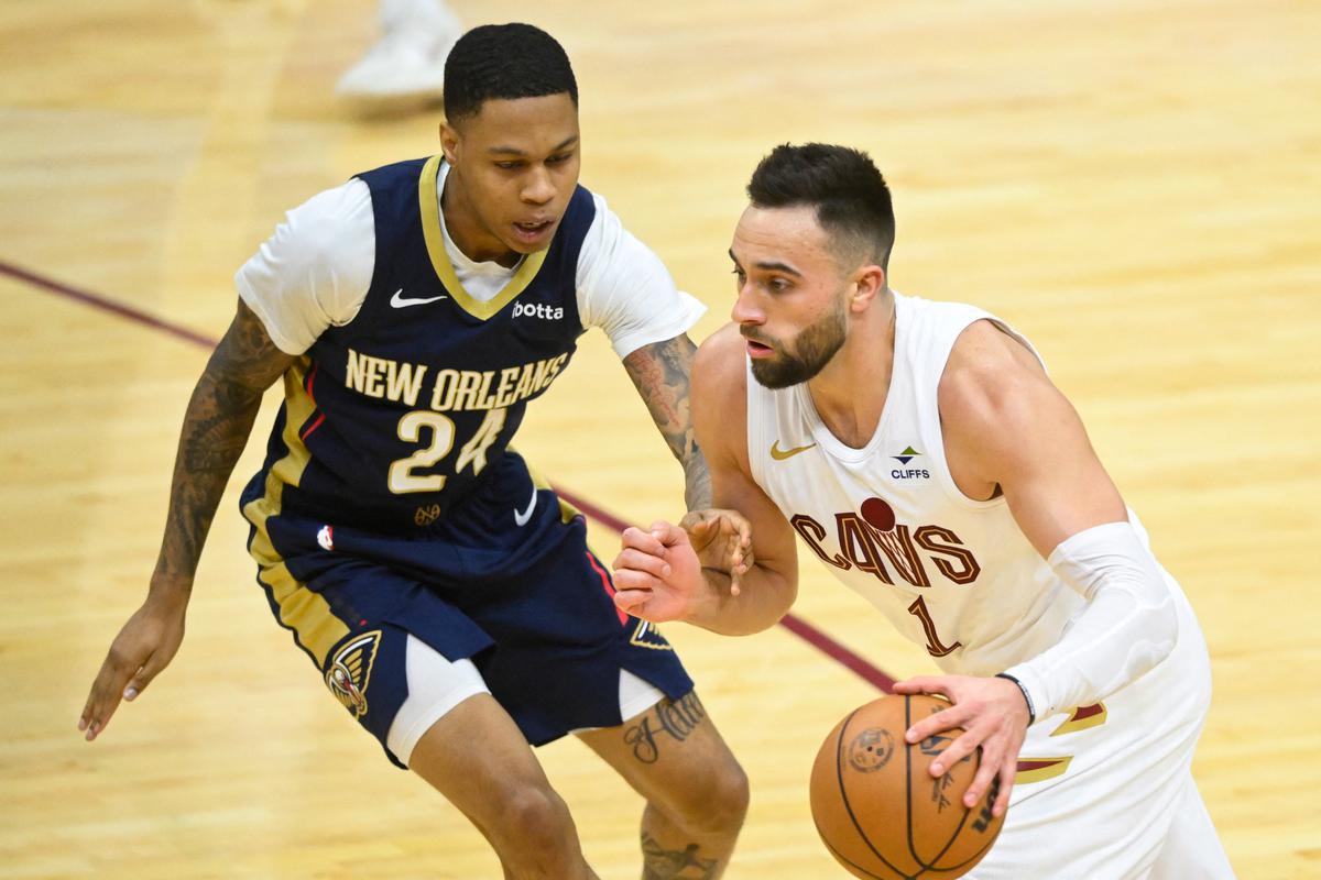 Cleveland Cavaliers guard Max Strus (1) dribbles past New Orleans Pelicans guard Jordan Hawkins (24) in the fourth quarter at Rocket Mortgage FieldHouse. 