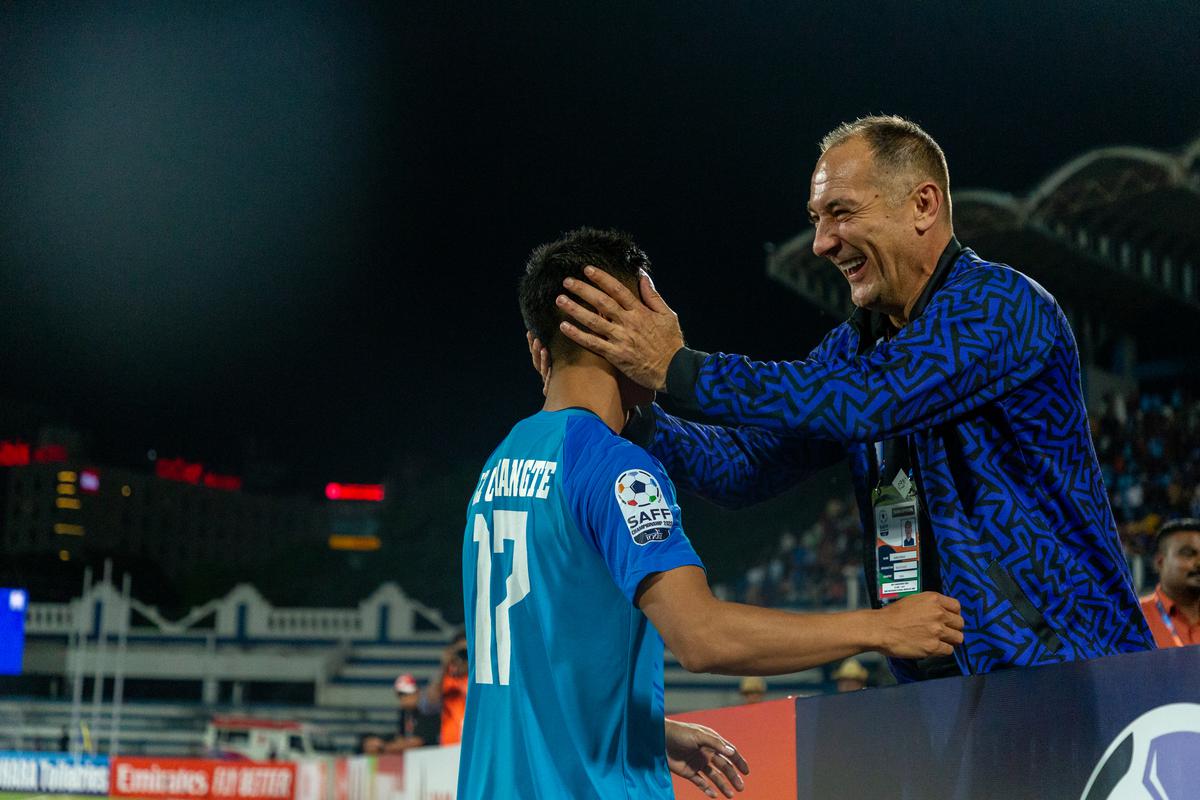 An option on the cards: Igor Stimac (right) celebrates winning the SAFF Championship with Chhangte, one of the forwards in the National team, who has also impressed in the ISL.