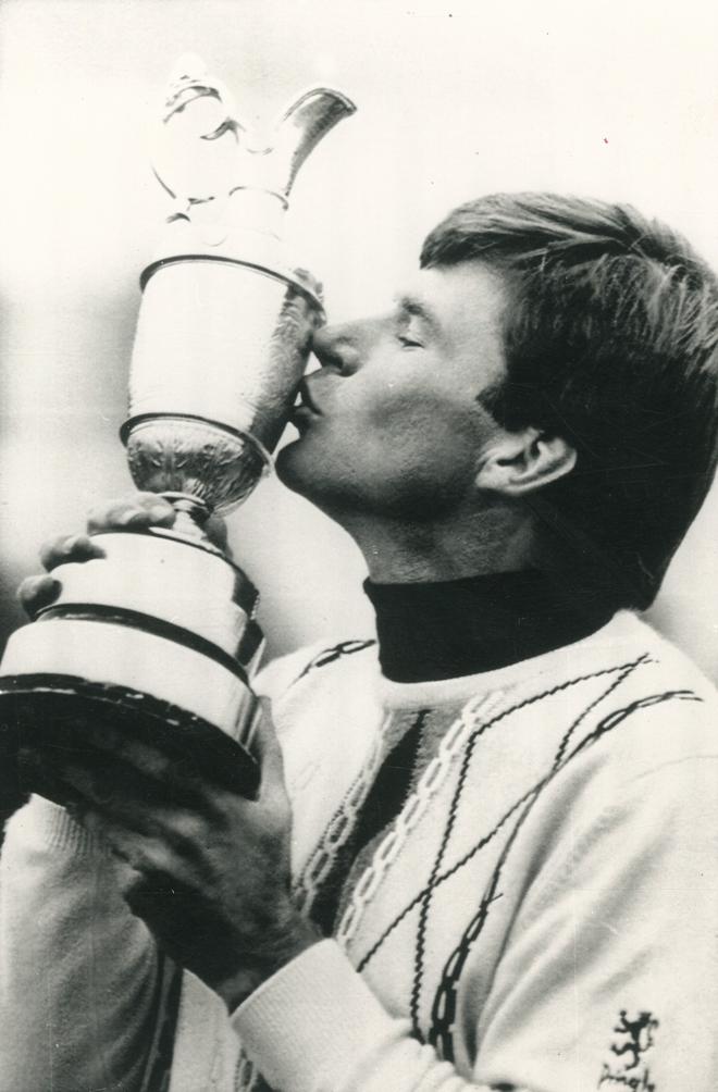 Britain’s Nick Faldo kisses the trophy after winning the 1987 Open Championship.