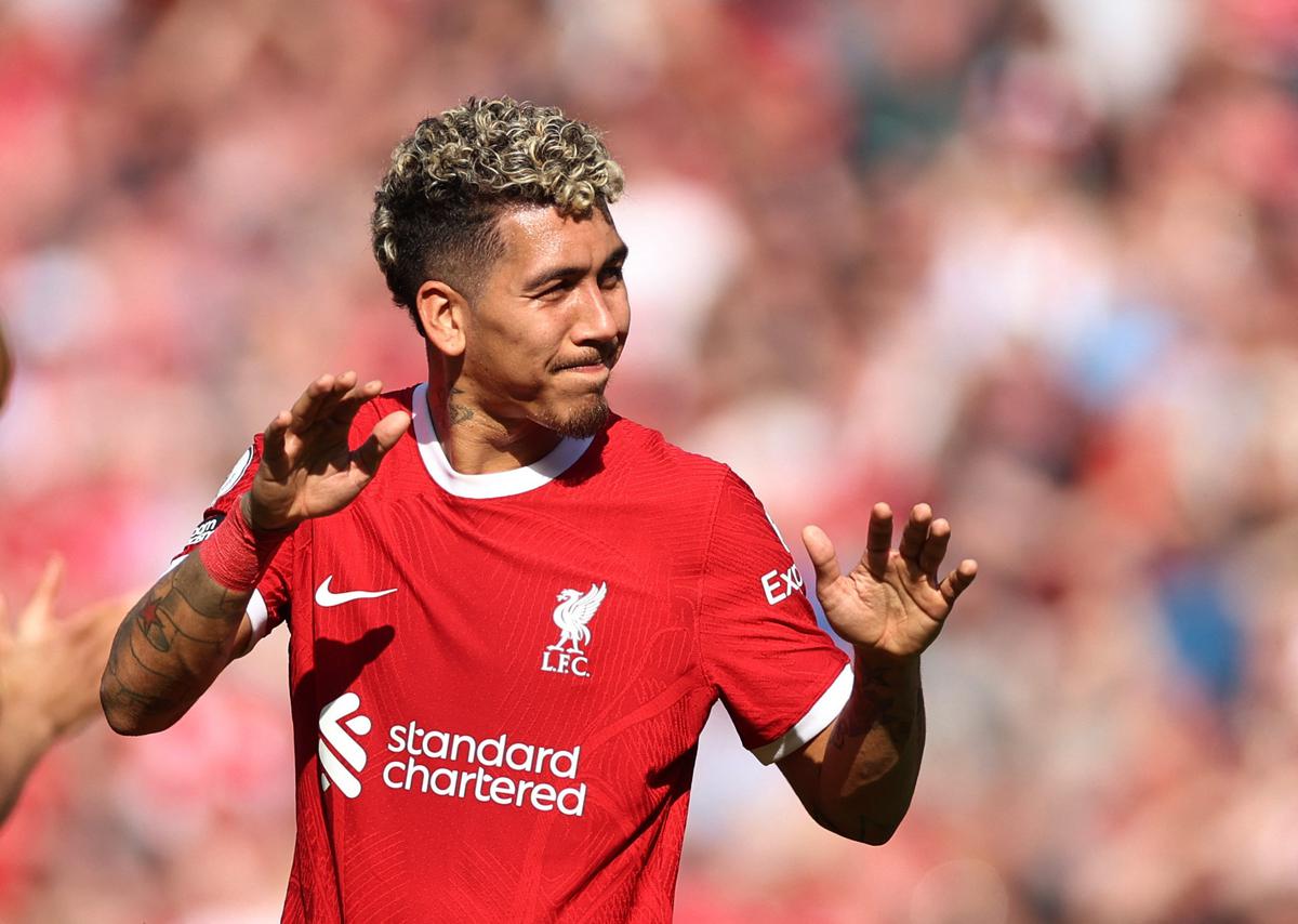 Firmino scores late goal against Villa to keep Liverpool’s Champions League hopes alive