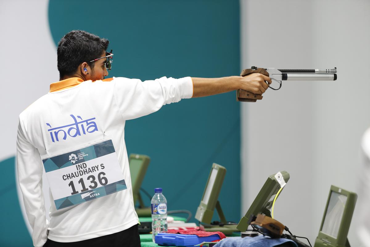 India’s Saurabh Chaudhary shoots in the final round of the 10m air pistol men’s final during the 18th Asian Games.