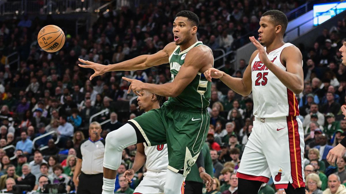 Antetokounmpo, Lillard help Bucks build big lead, hold off Heat in playoff  rematch