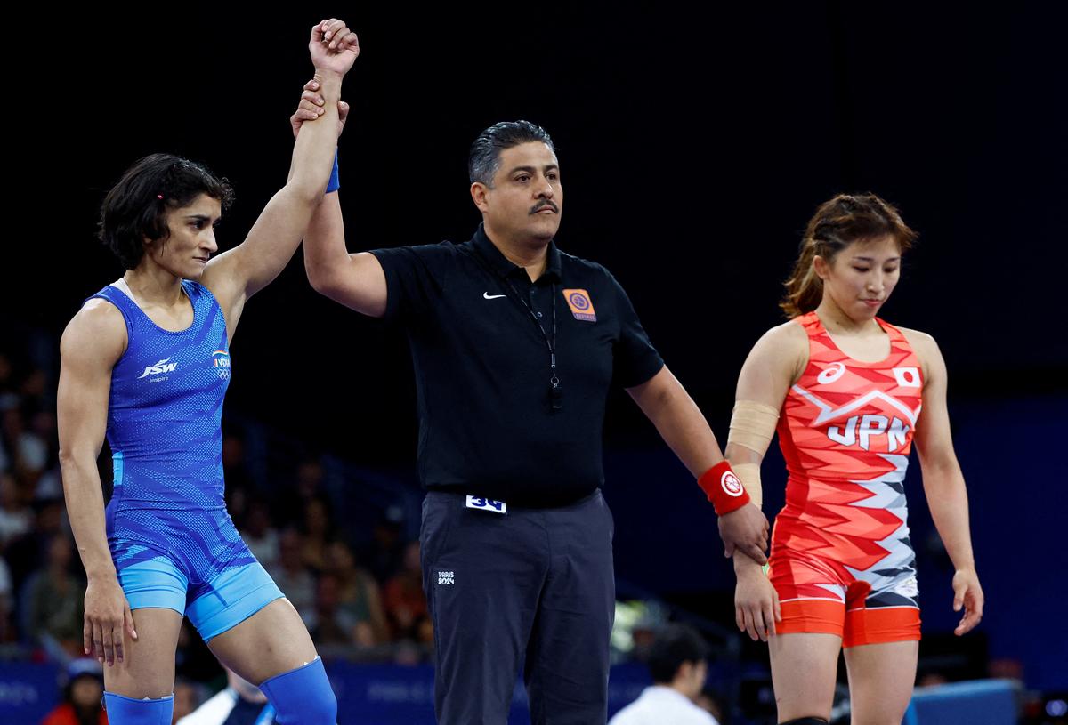 Vinesh Phogat of India reacts after winning the match against Yui Susaki of Japan. 