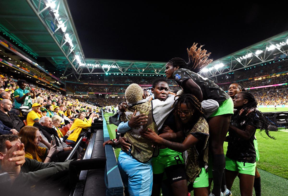 Asisat Oshoala (2nd L) of Nigeria celebrates with teammates after scoring the winning goal against Australia in the FIFA Women’s World Cup.