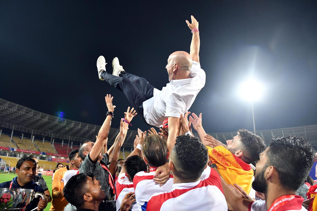 FILE PHOTO: Team Atletico De Kolkata FC celebrate their win over Chennaiyin FC with coach Antonio Habas at Jawaharlal Nehru Stadium, Goa.