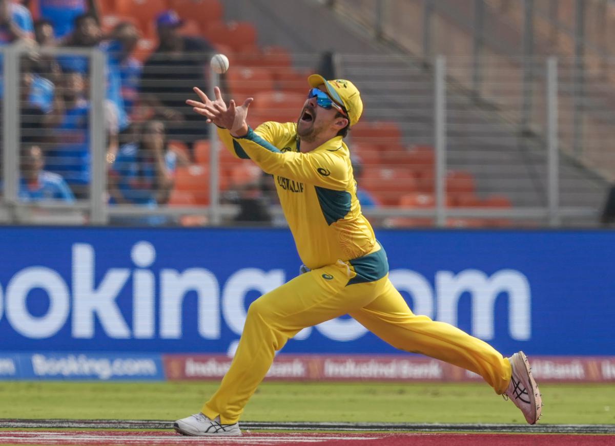Australia’s Travis Head takes the catch of India’s Rohit Sharma during the ICC Men’s Cricket World Cup 2023 final match between India and Australia. 