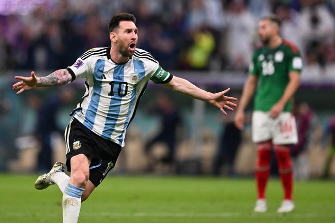 Lionel Messi celebrates scoring the opening goal during the Qatar 2022 World Cup Group C football match between Argentina and Mexico at the Lusail Stadium in Lusail, north of Doha on November 26, 2022. 