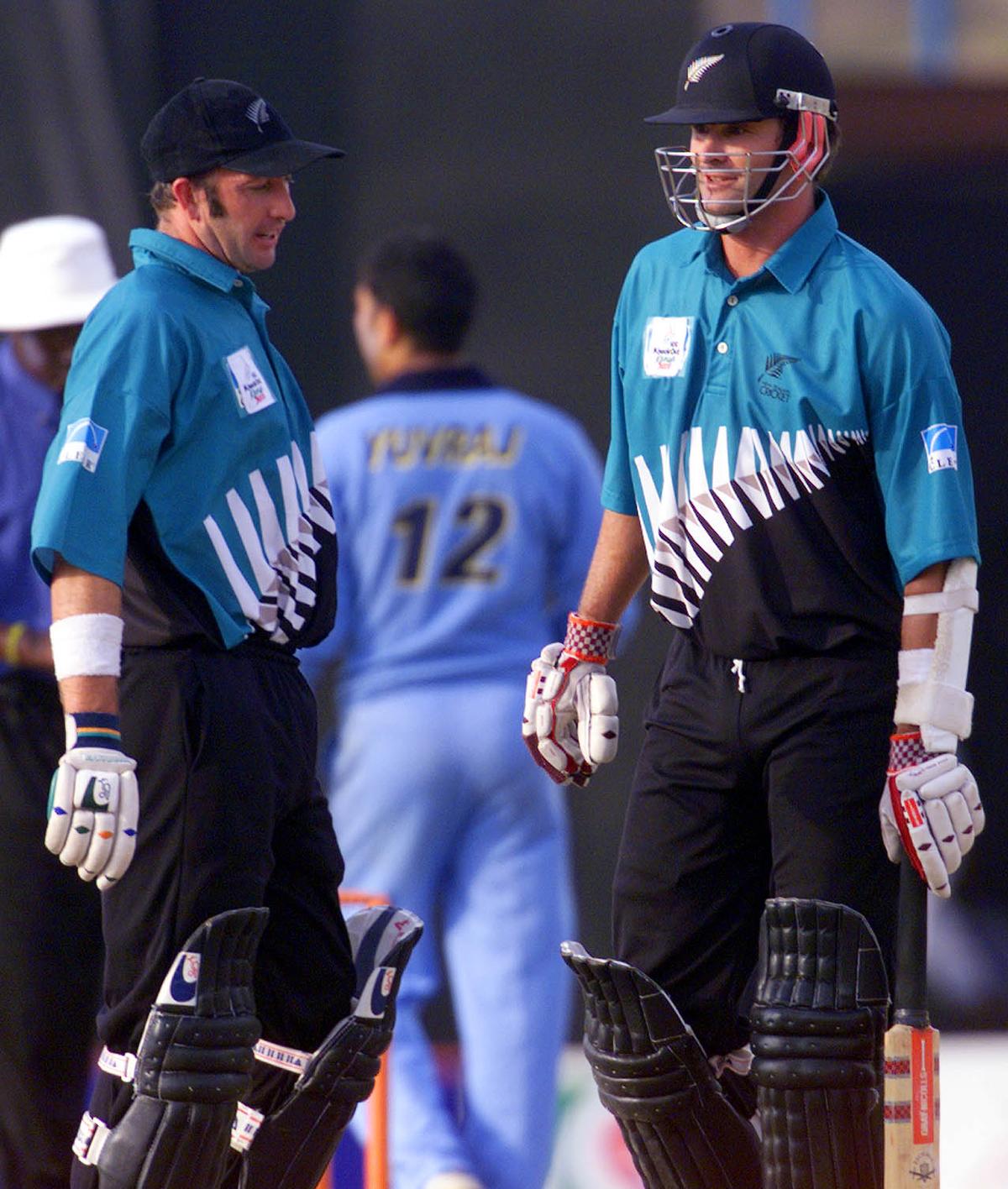 FILE PHOTO: Chris Cairns and Chris Harris during their 122-run partnership against India in the 2000 Knockout Trophy Final. 