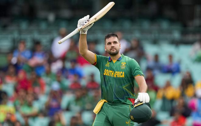 South Africa’s Rilee Rossouw celebrates after scoring a century during the T20 World Cup cricket match against Bangladesh.