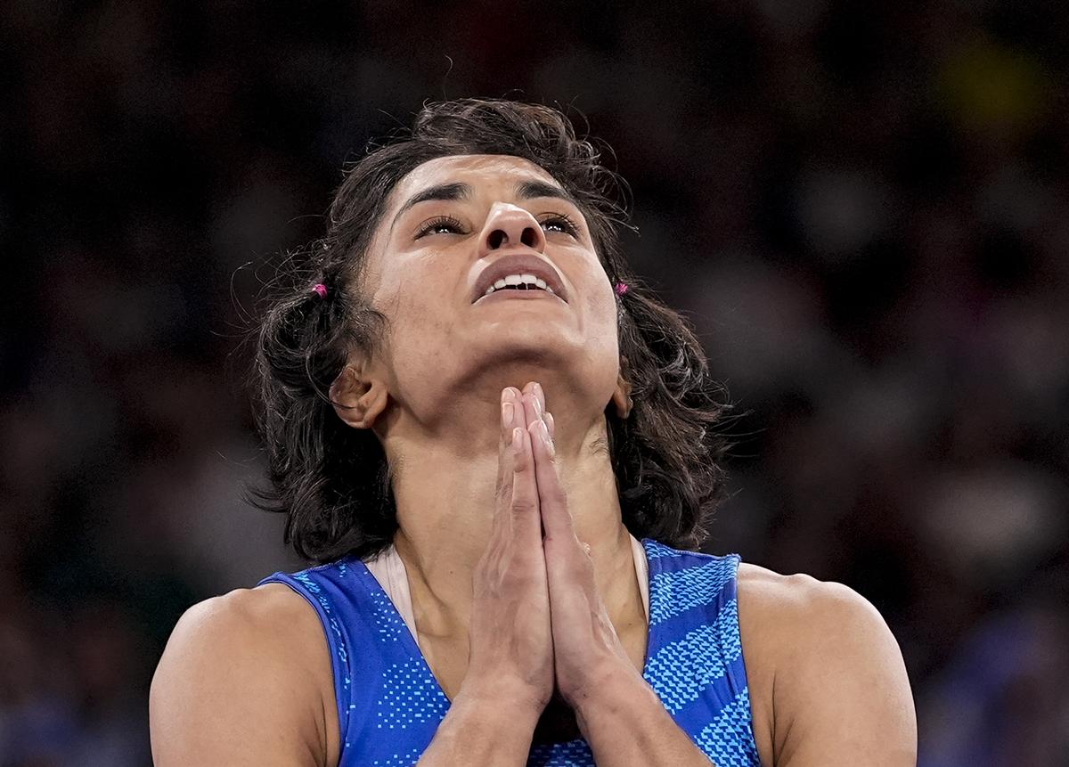 Indian wrestler Vinesh Phogat reacts after winning the round of 16 of the women’s freestyle 50kg wrestling match against Japan’s Yui Susaki.