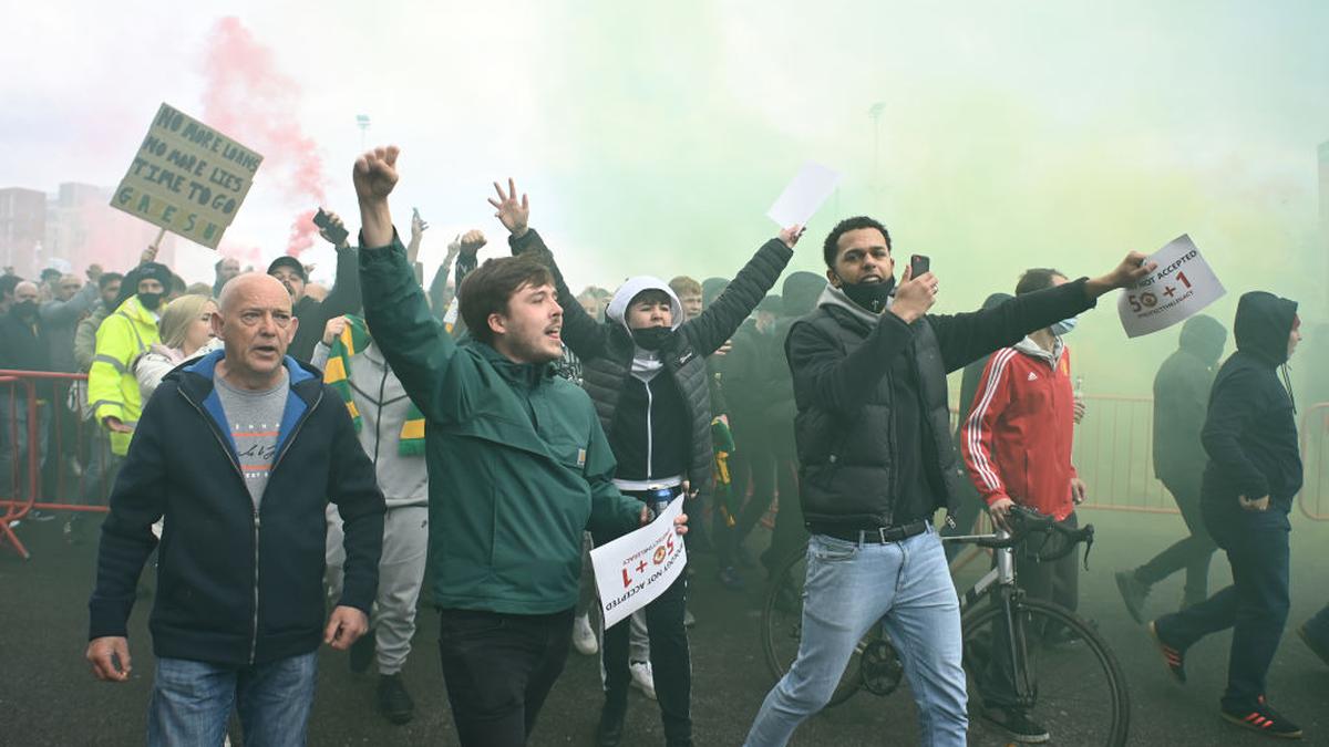 In pictures: Fans storm into Old Trafford protesting against Glazers after Super League fallout