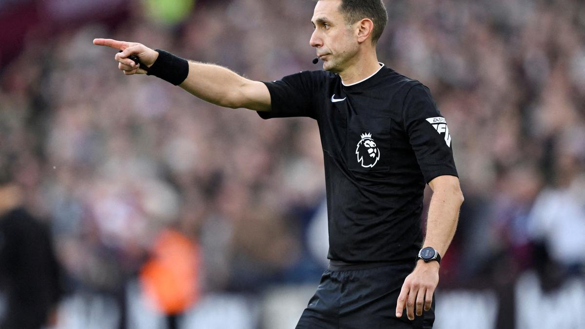 Referee David Coote under FA investigation because of alleged discussions with fan about a yellow card