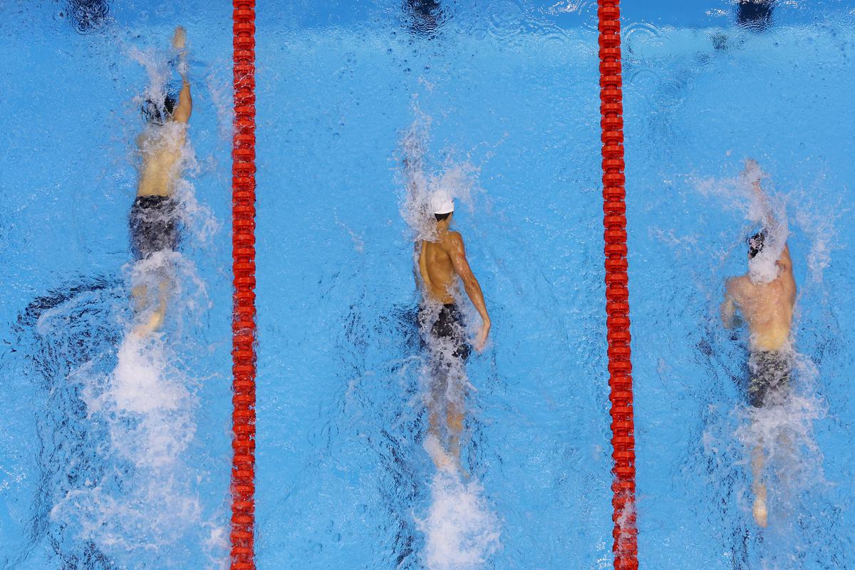 Sunwoo Hwang of Team South Korea,  David Popovici of Team Romania and Luke Hobson of Team United States compete in the Men’s 200m Freestyle Final on day three of the Fukuoka 2023 World Aquatics Championships.