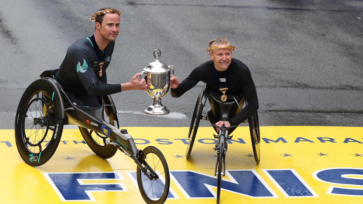 Hug, Scaroni take Boston Marathon wheelchair titles