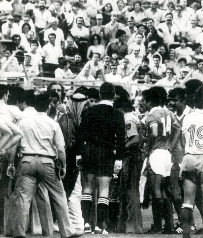 Prince Fahad Al Sabah, President of the Kuwait Football Association and brother of Emir of Kuwait, center, alongside Soviet referee Marislov Stupar (centre) on the pitch at Valladolid in Spain on June 21, 1982. France’s fourth goal was ruled out which resulted in a mass argument between players and officials.