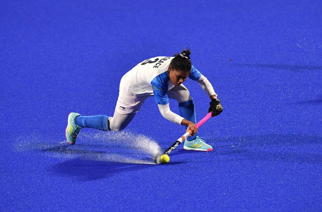 India’s Deep Grace Ekka hits the ball during the women’s field hockey semi-final match between India and China at the 2018 Asian Games in Jakarta on August 29, 2018.