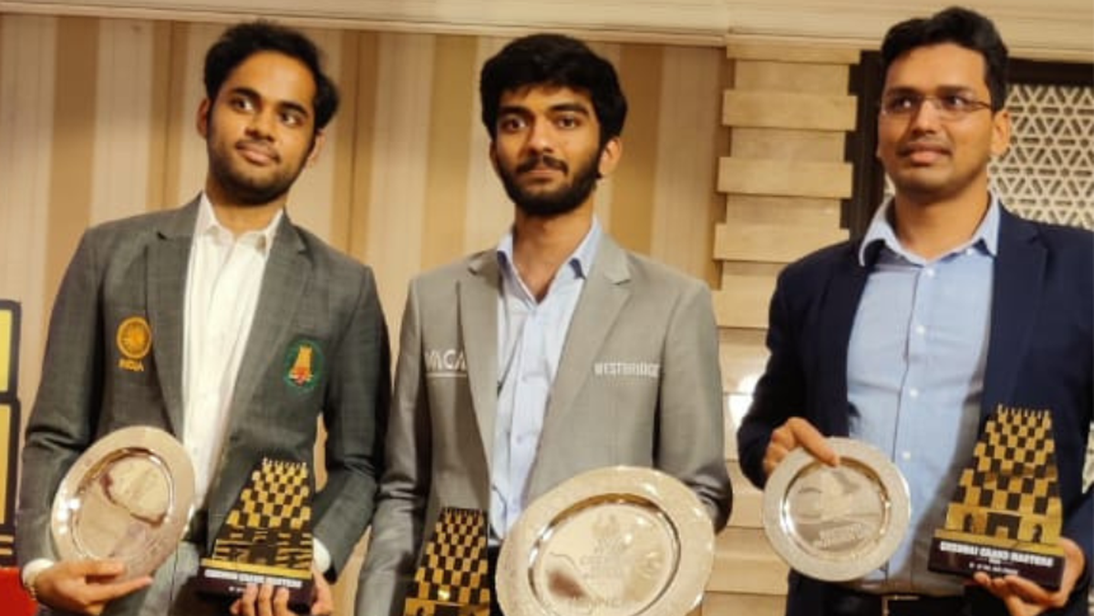 (L-R) Arjun Erigaisi, D. Gukesh and Pentala Harikrishna after Chennai Grand Masters 2023. 