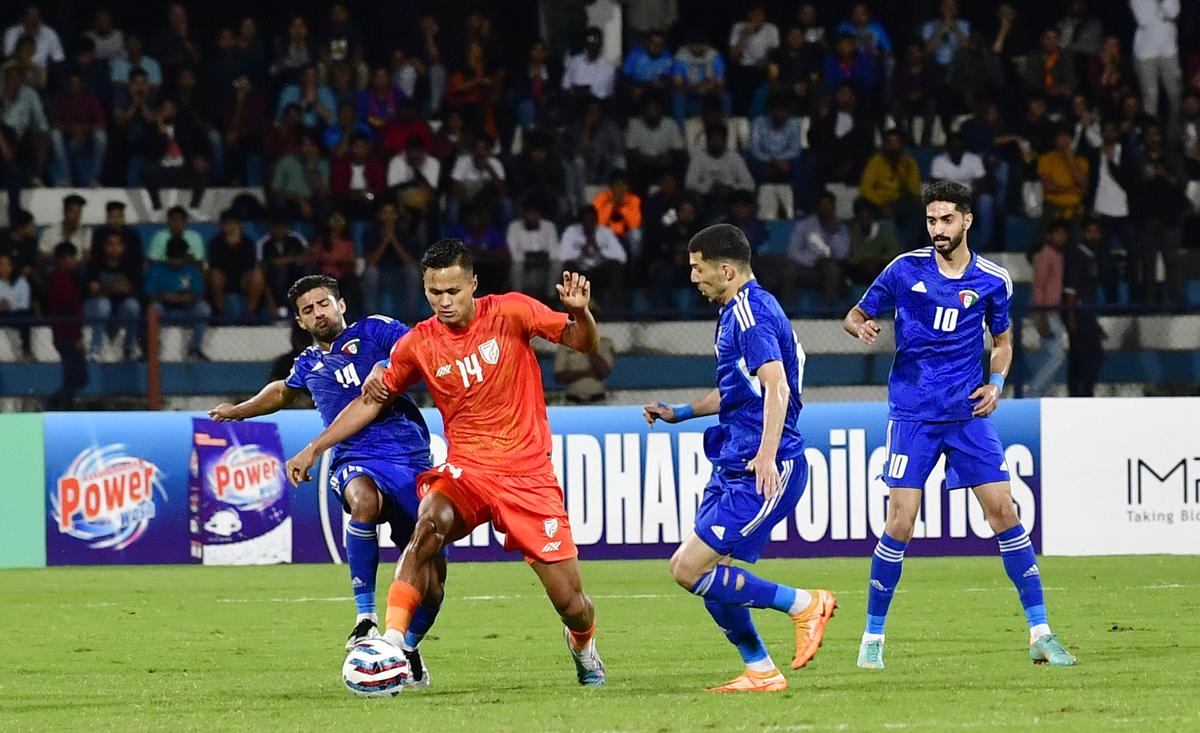 India’s Jeakson Singh (14-orange) in action against Kuwait in the SAFF Championship final at the Kanteerava Stadium, in Bengaluru.
