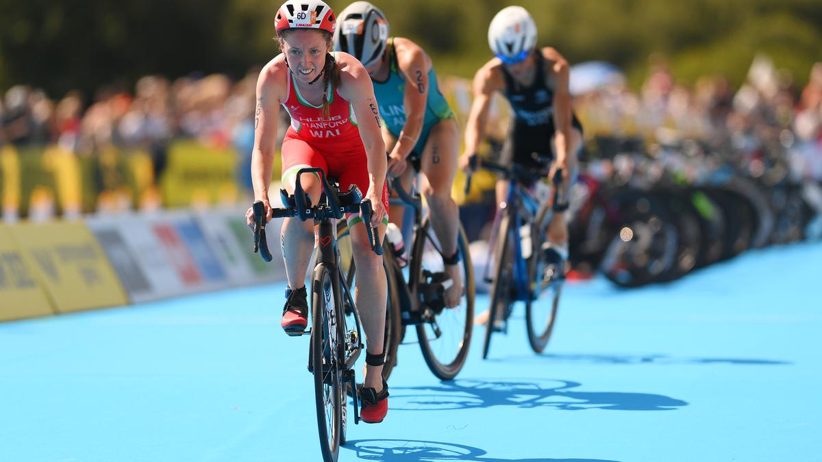 Triathlon lets transgender women compete under tighter rules