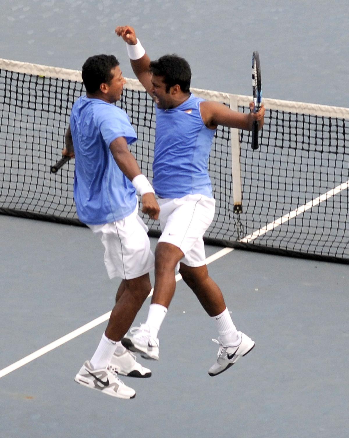 Deadly duo: Leander Paes (right) and Mahesh Bhupathi celebrate after beating Brazil’s Marcelo Melo and Bruno Soares during the Davis Cup World Group play-off in Chennai on September 18, 2010. 