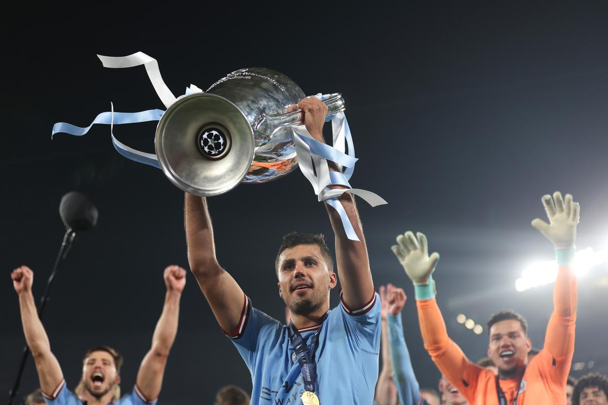 Rodri of Manchester City celebrates with the UEFA Champions League trophy after the team’s victory during the UEFA Champions League 2022/23 final match between FC Internazionale and Manchester City FC at Ataturk Olympic Stadium on June 10, 2023 in Istanbul, Turkey.