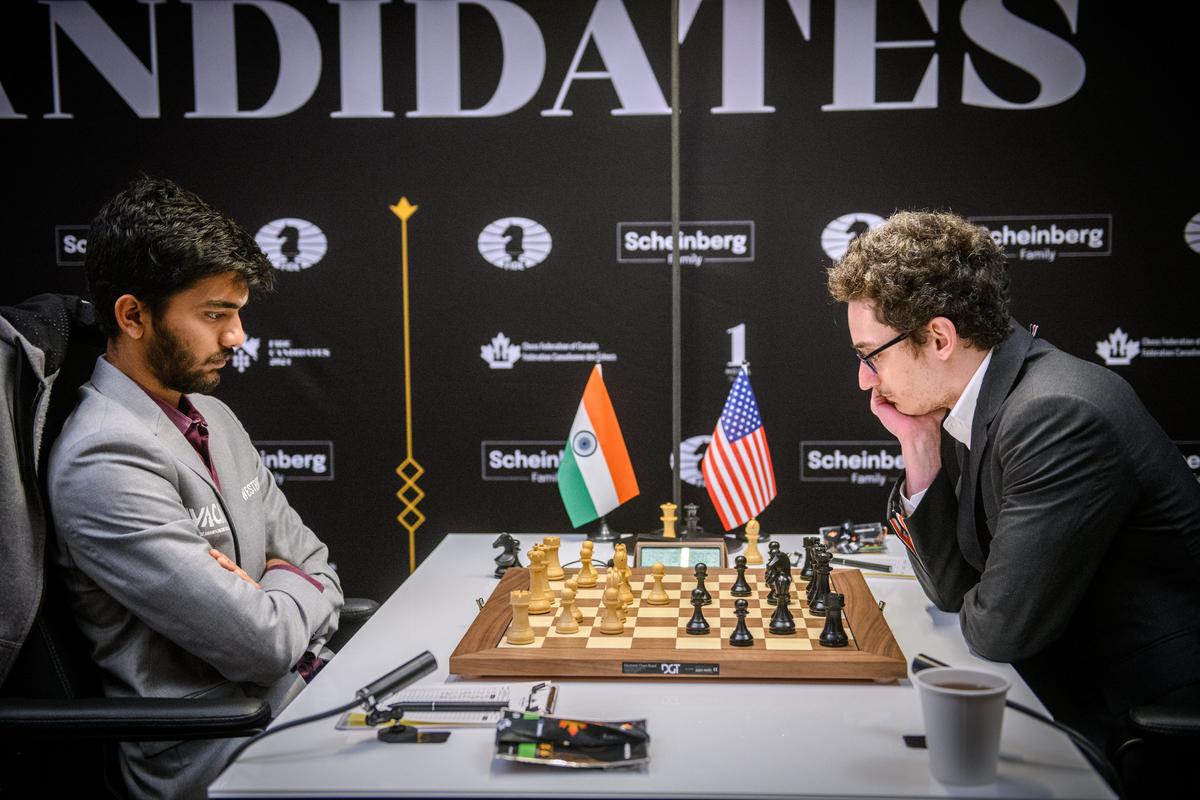 Gukesh (left) of India and Fabiano Caruana of USA drew as the Indian became the youngest player ever to win the Candidates