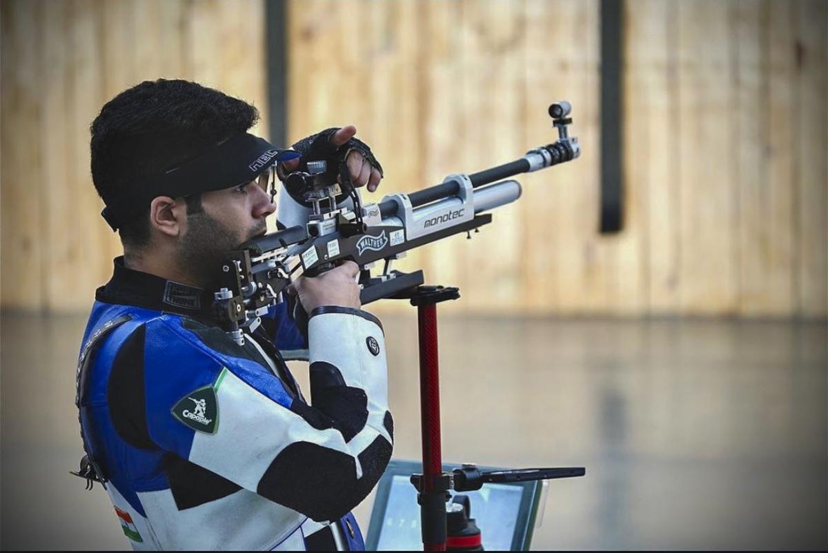 India’s shooter Arjun Babuta competes in men’s 10m air rifle final round. 