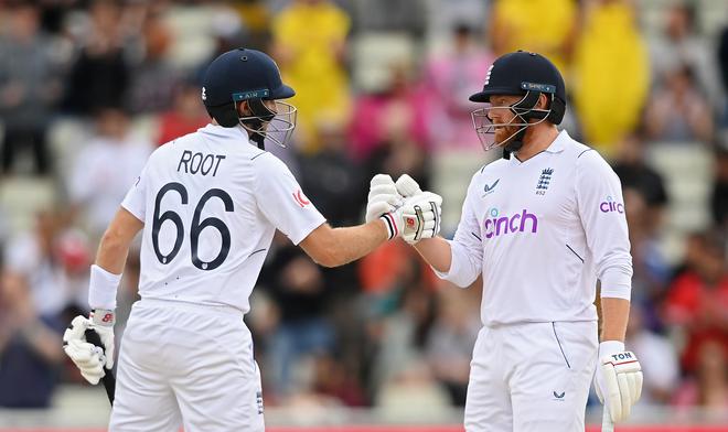 Joe Root and Jonny Bairstow of England in action during Day Five of the Fifth Test Match at Edgbaston on July 05, 2022 in Birmingham, England.
