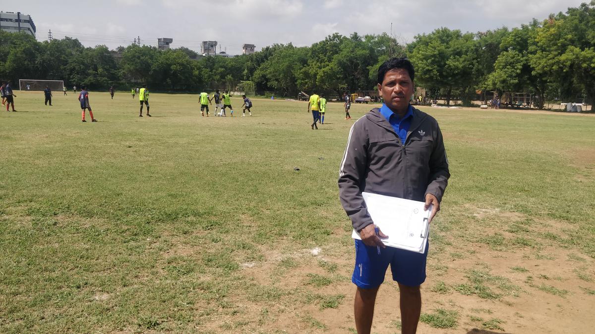 Former national footballer and now head coach of Telangana under-17 team, Sheikh Abdul Rahman, monitoring the selections for the State
team at Gymkhana Ground in Hyderabad on Monday.